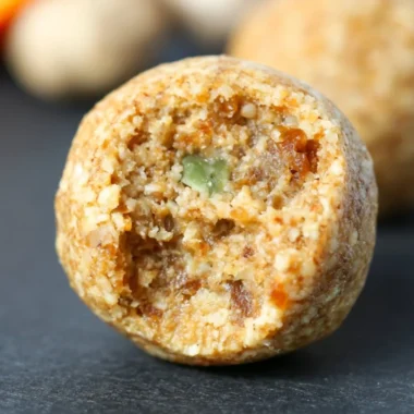 Cozy anti-inflammatory ginger energy balls on a wooden table