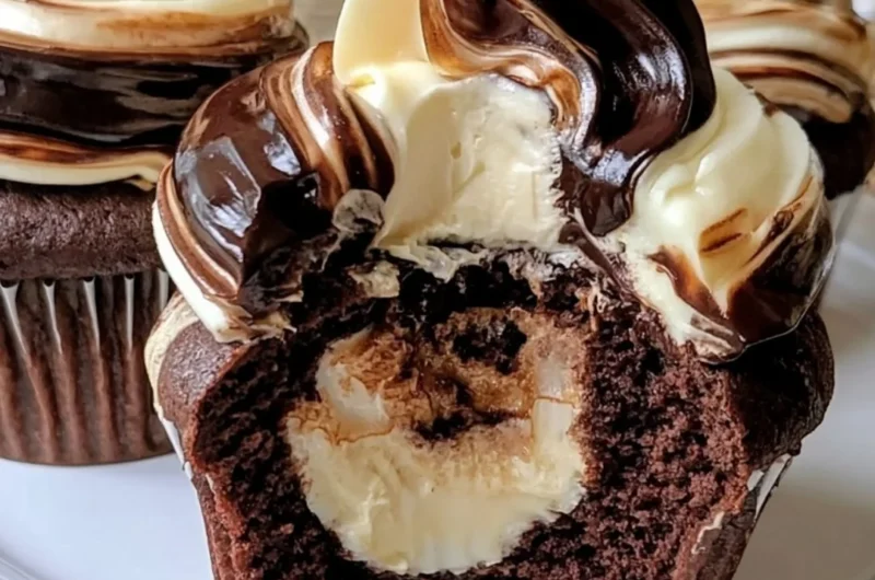 Delicious cozy chocolate coffee cupcakes topped with creamy frosting