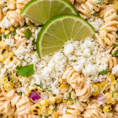 Fresh Mexican Street Corn Pasta Salad with colorful ingredients and toppings.