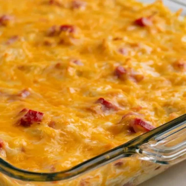 Super cheesy ham and potato casserole baked to perfection with creamy cheese sauce.