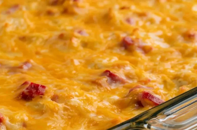 Super cheesy ham and potato casserole baked to perfection with creamy cheese sauce.